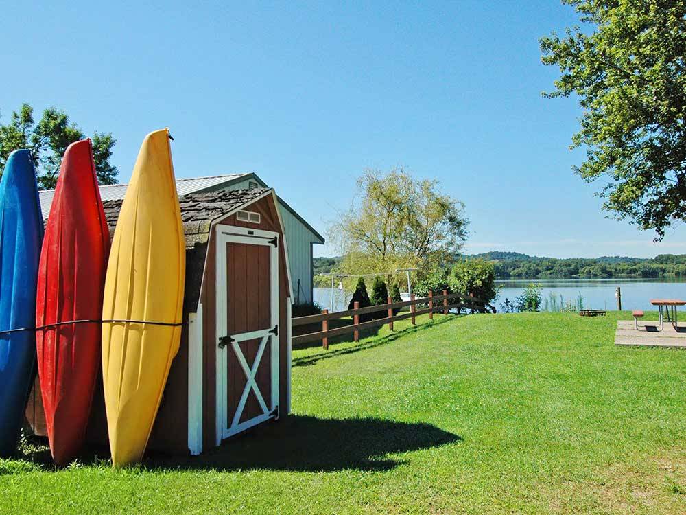Boating shed and canoes near the lake at NESHONOC LAKESIDE