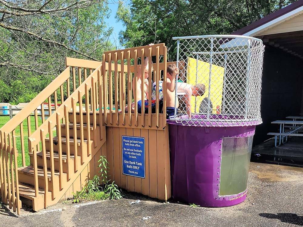 Kids in the Dunk Tank at BARABOO RV RESORT BY RJOURNEY