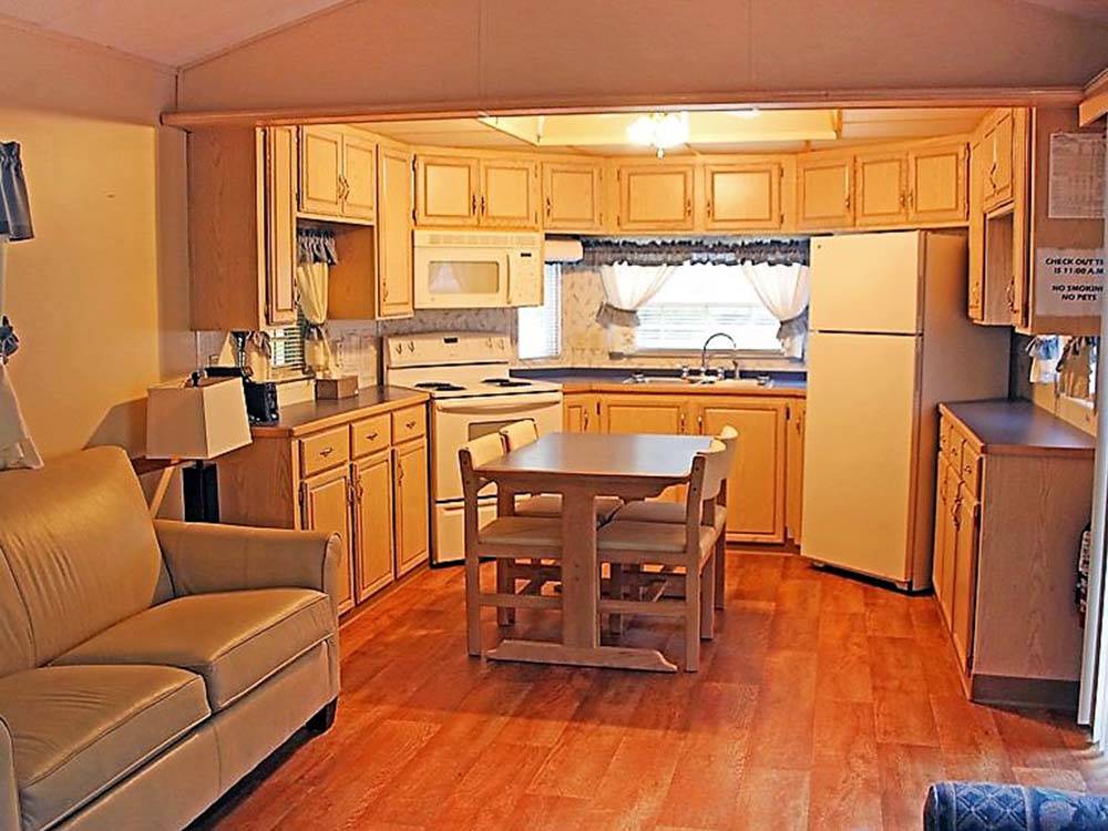 The kitchen area of the cabin at BARABOO RV RESORT BY RJOURNEY