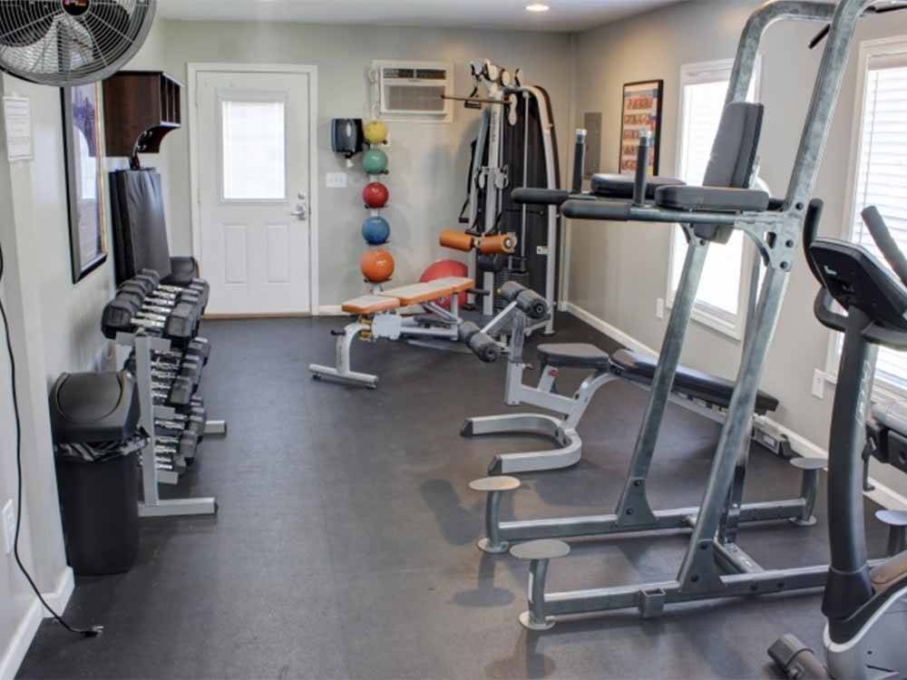 The exercise room equipment at FAYETTEVILLE RV RESORT & COTTAGES