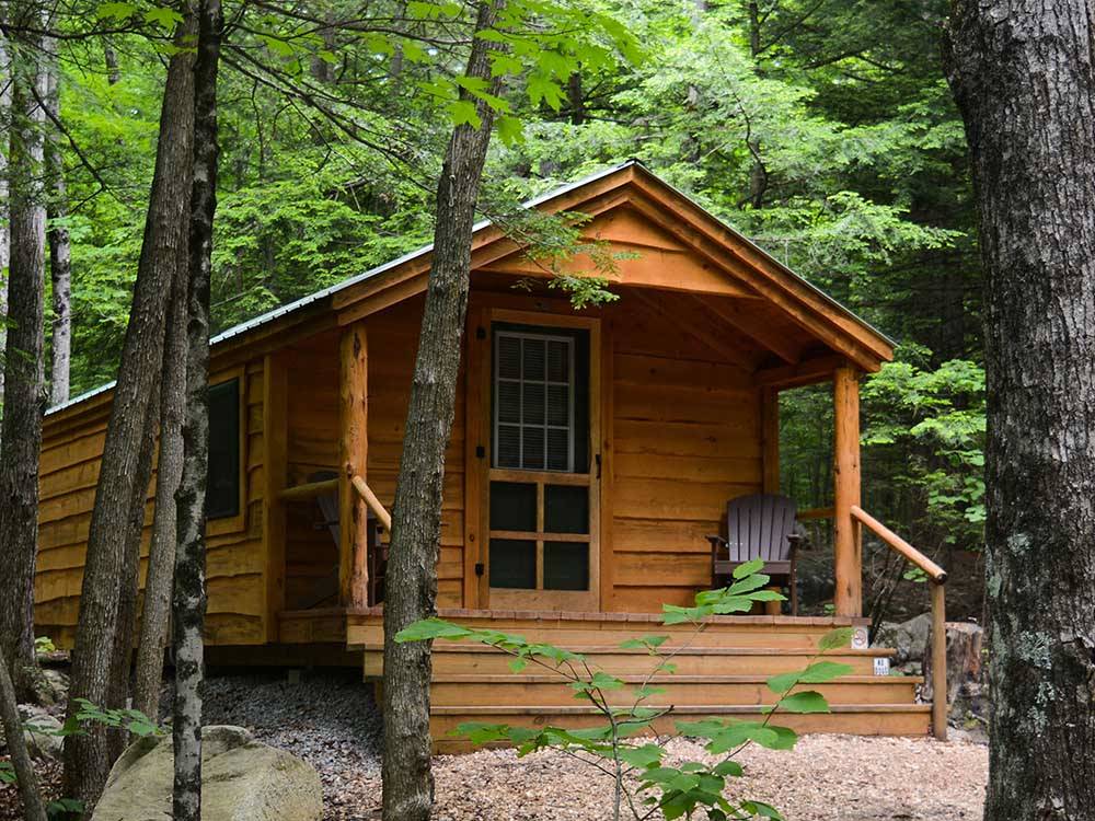 An outside view of a rental cabin at LAKE GEORGE CAMPING VILLAGE