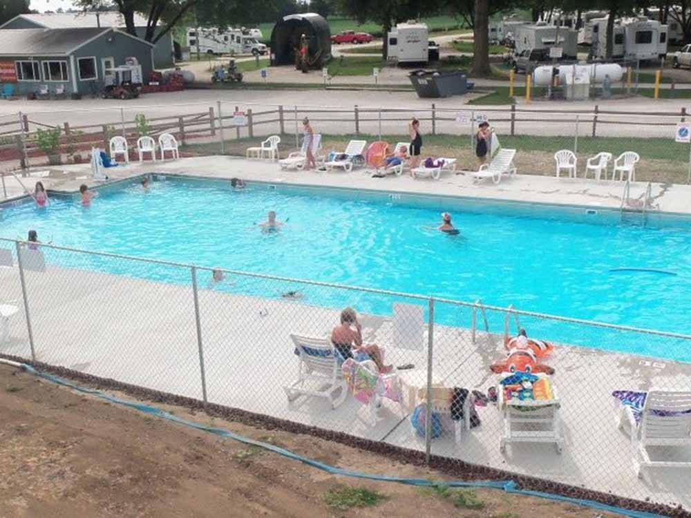 People around the swimming pool at DOUBLE J CAMPGROUND