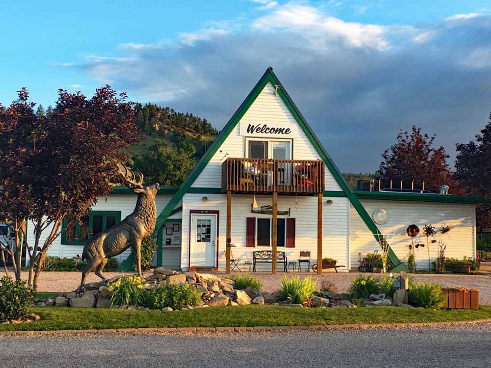 Office building with a moose statue in front at MOUNTAIN VIEW RV PARK & CAMPGROUND