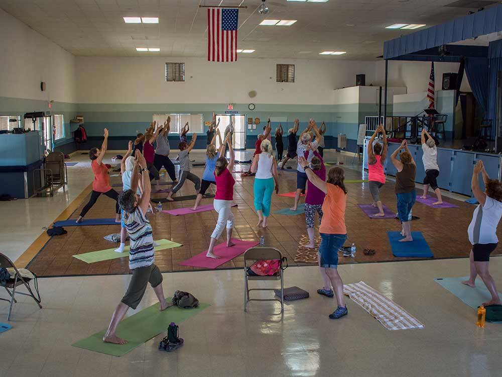 People exercising in a group class at FOUNTAIN OF YOUTH SPA RV RESORT