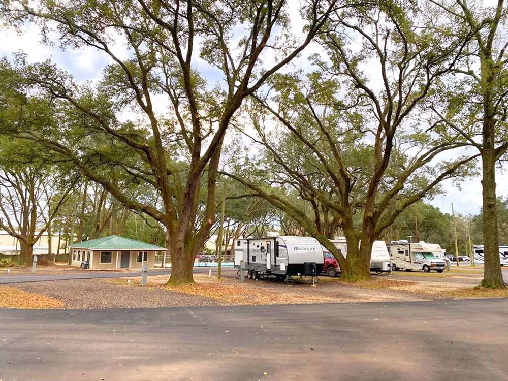 Several travel trailers parked at I-10 KAMPGROUND