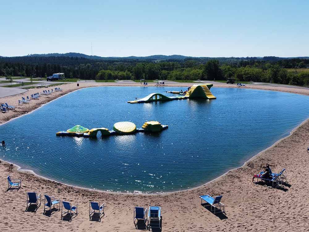 An aerial view of the swimming lake at STONEY CREEK RV RESORT
