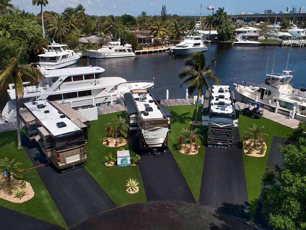 RV sites with a yacht docked at YACHT HAVEN PARK & MARINA