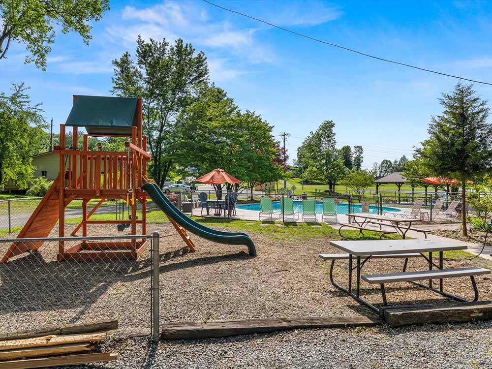 The playground next to the swimming pool at MOUNTAINEER CAMPGROUND