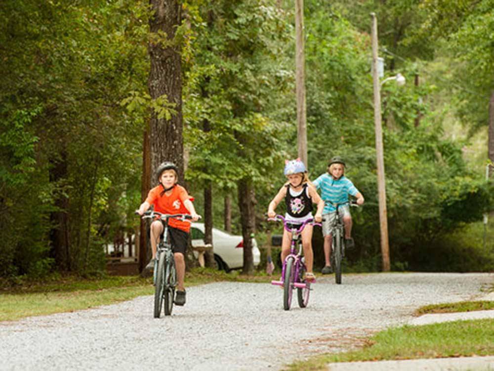 Kids riding bicycles through the campground at TALLAHASSEE EAST CAMPGROUND