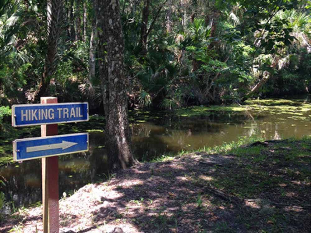 Sign for the hiking trail at SUGAR MILL RUINS TRAVEL PARK