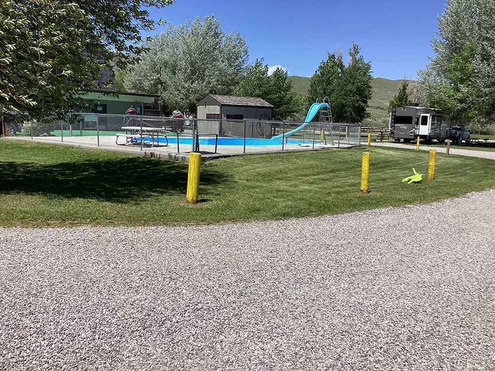 The swimming pool area at BEAVERHEAD RIVER RV PARK & CAMPGROUND