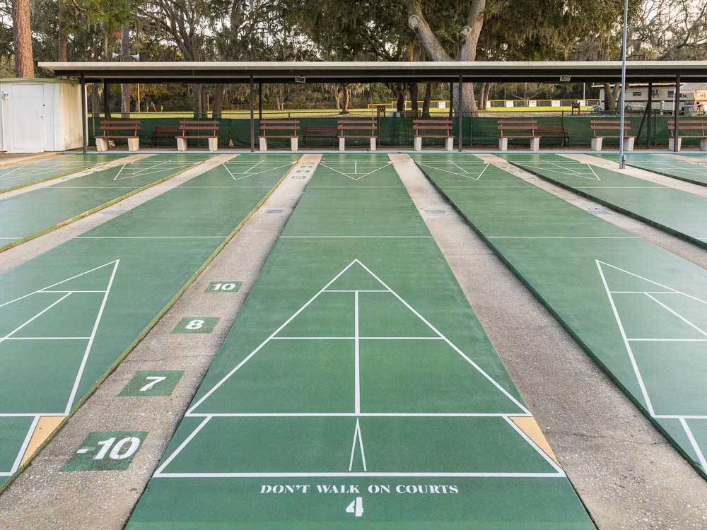 Three shuffleboard courts at HOLIDAY RV VILLAGE