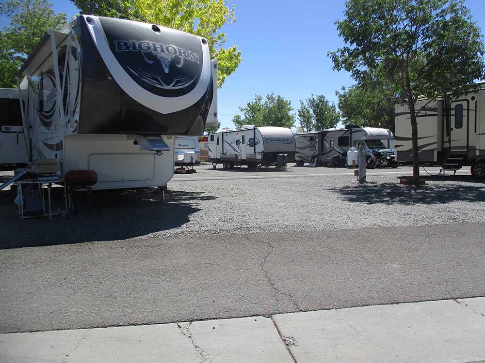A group of gravel RV sites at CAMP-N-TOWN RV PARK