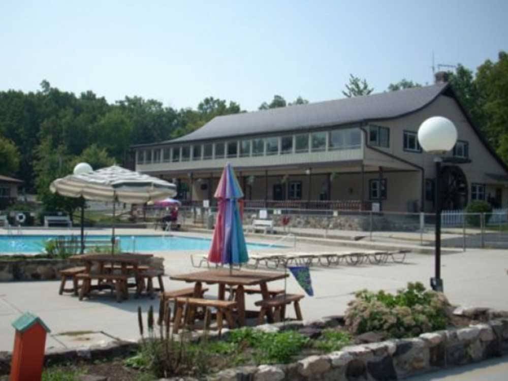 Pool area with picnic tables at ROUND TOP CAMPGROUND