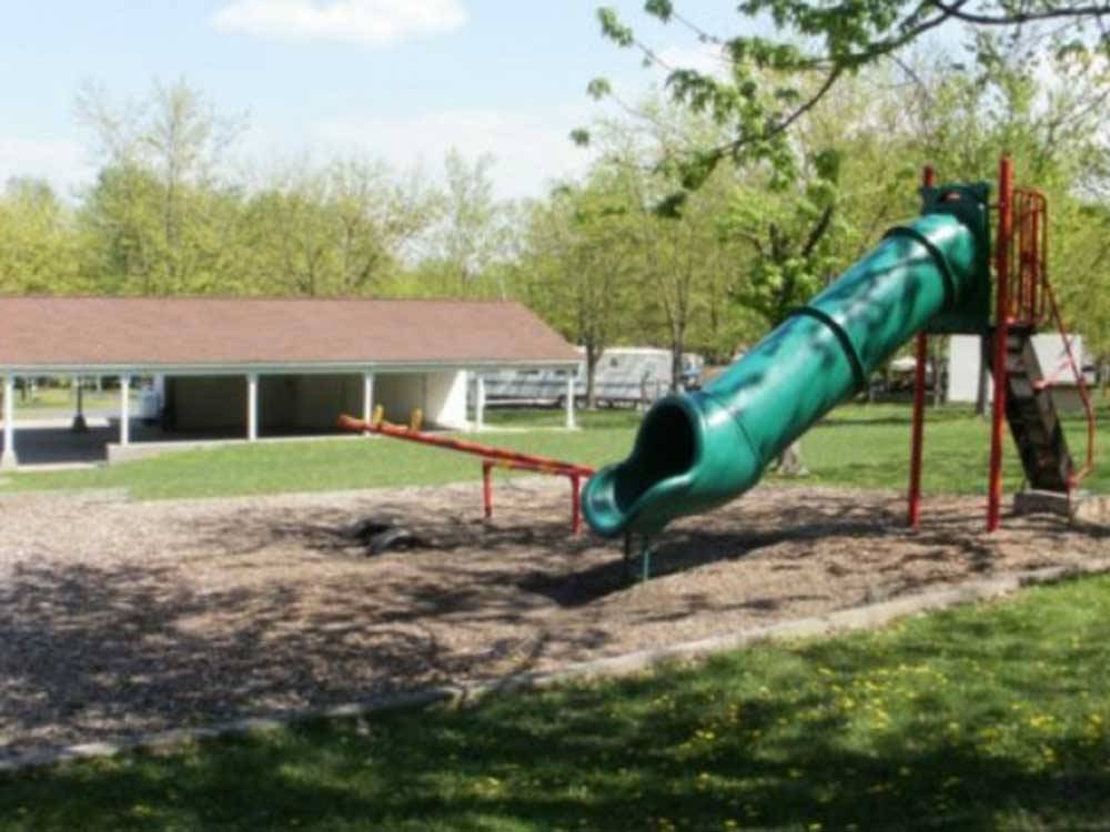 Playground with slide next to the pavilion at ROUND TOP CAMPGROUND