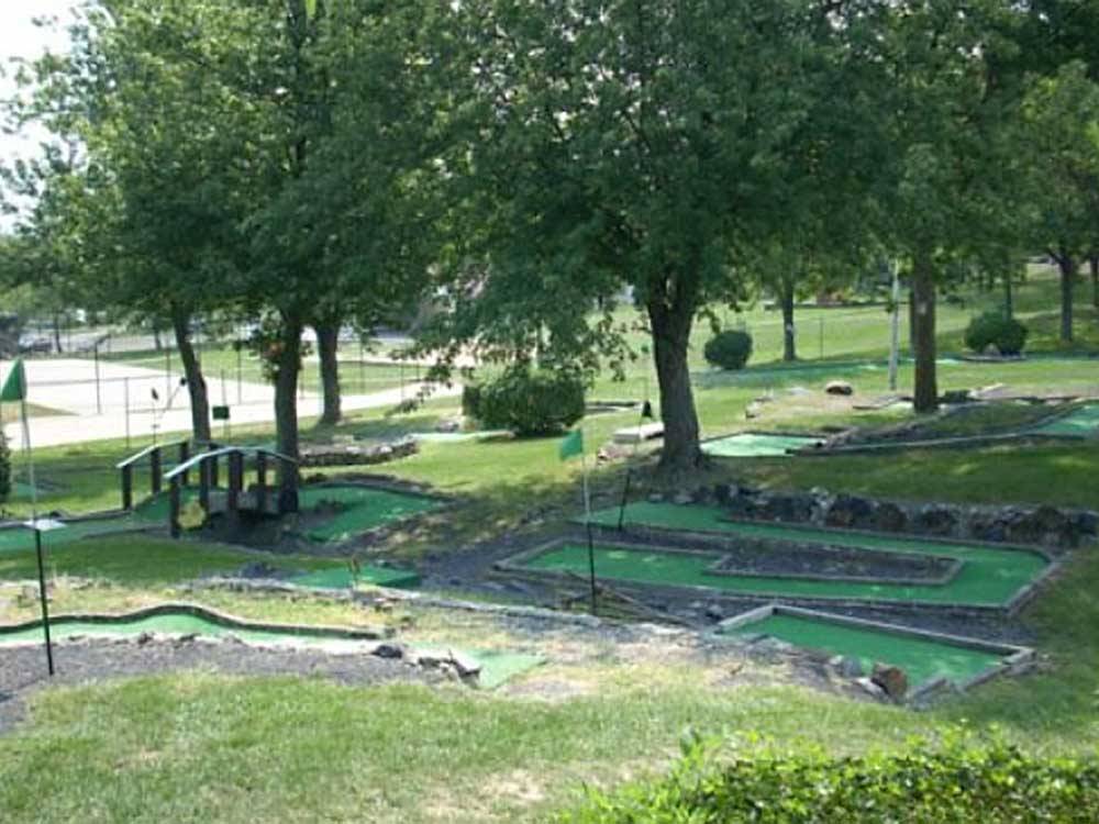 Mini golf course with trees at ROUND TOP CAMPGROUND