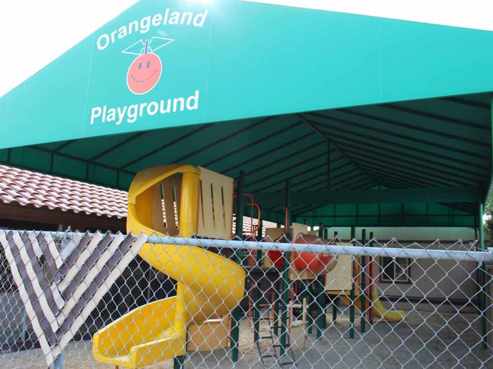 The covered outside play area at ORANGELAND RV PARK