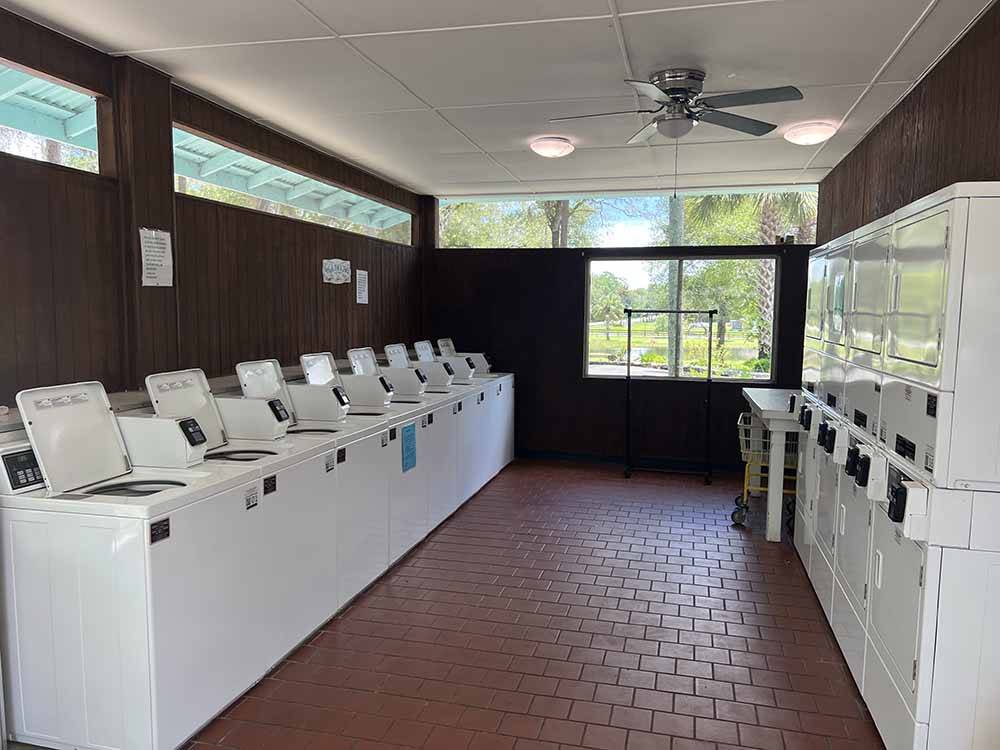 The washer and dryers in the laundry room at LUNA SANDS RV RESORT