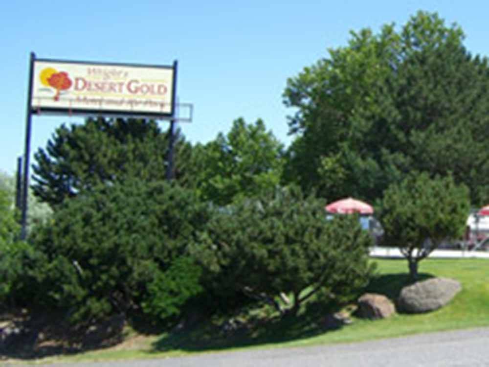 The front entrance sign at WRIGHT'S DESERT GOLD MOTEL & RV PARK