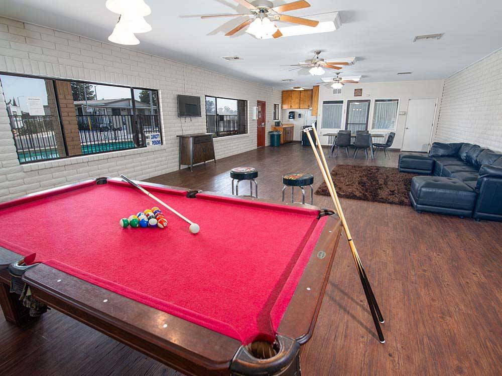 A pool table inside the lounge at SUN & FUN RV PARK