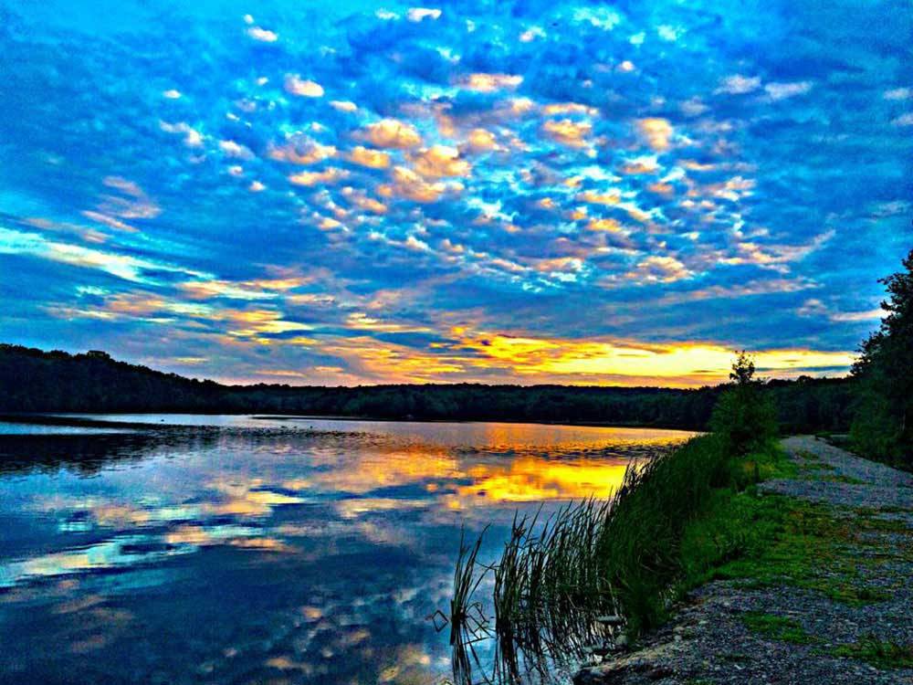 Beautiful sunrise on the lake at OTTER LAKE CAMP RESORT