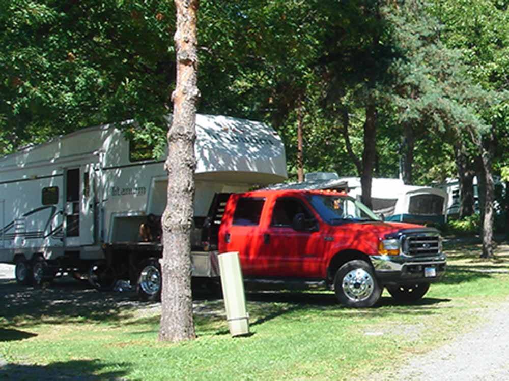 Fifth wheel in a campsite at FOUR SEASONS CAMPGROUNDS