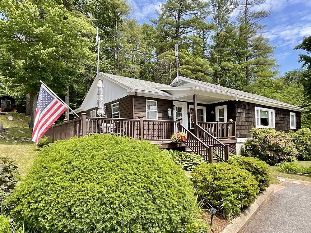 Main building surrounded by trees at LONG ISLAND BRIDGE CAMPGROUND