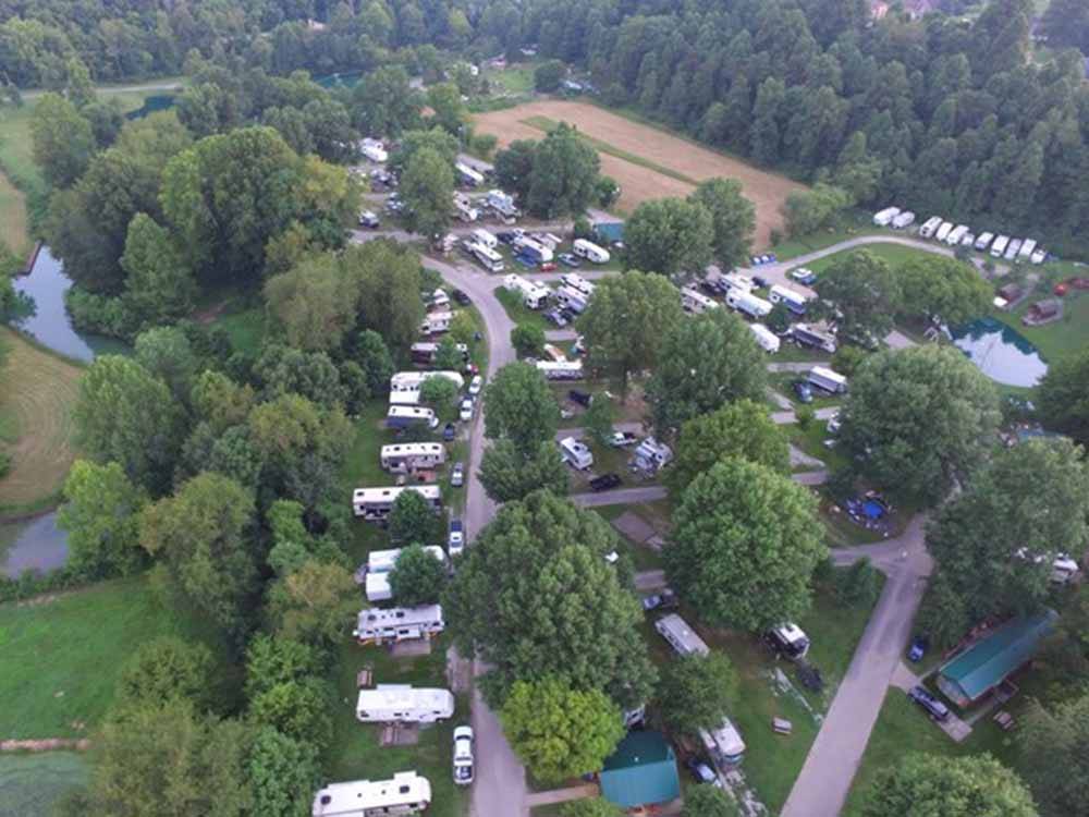 An aerial view of the wooded campsites at HUNTINGTON FOX FIRE KOA