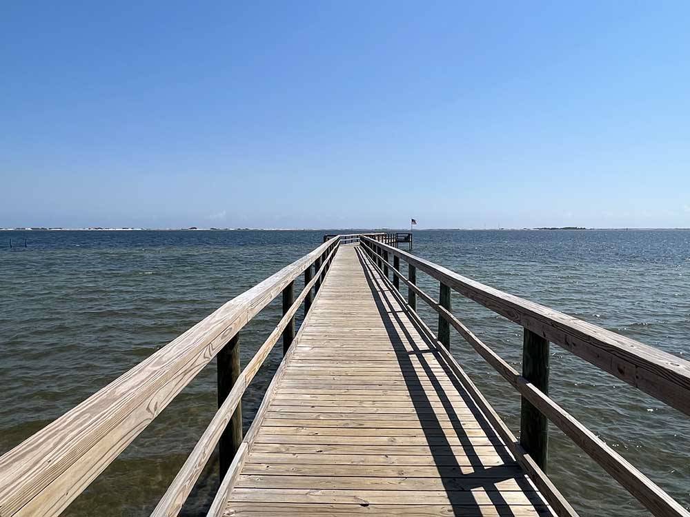 The long pier in the beach at NAVARRE BEACH CAMPING RESORT