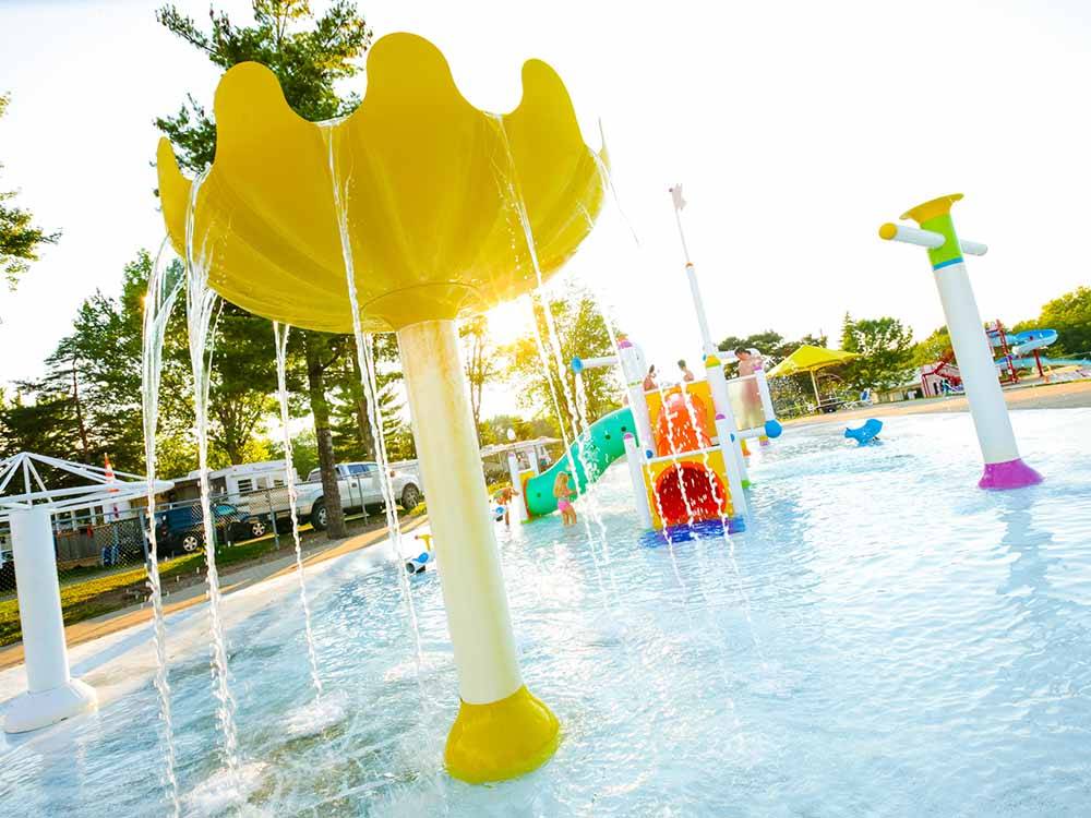 The splash pad in the swimming pool at BISSELL'S HIDEAWAY RESORT
