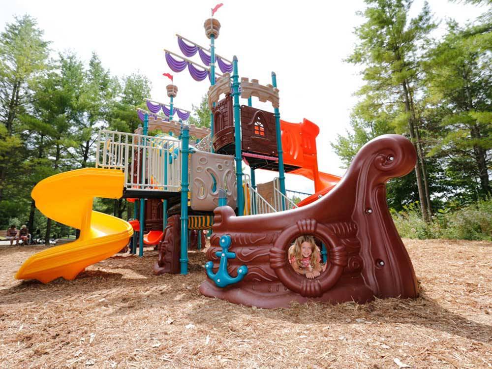 The children's playground at FISHERMAN'S COVE TENT & TRAILER PARK
