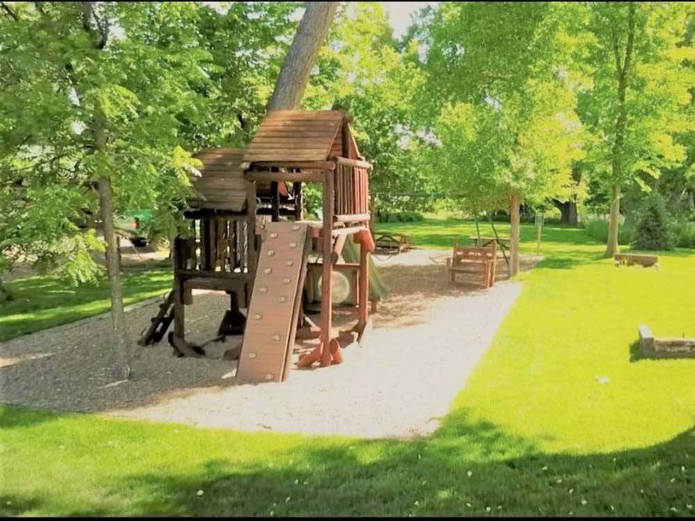 Playground for children at LAKE PARK CAMPGROUND & COTTAGES