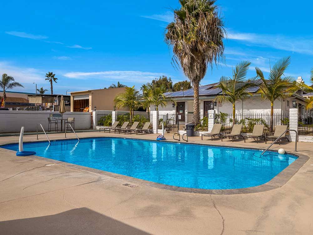 The outdoor pool on a sunny day at OCEANSIDE RV RESORT