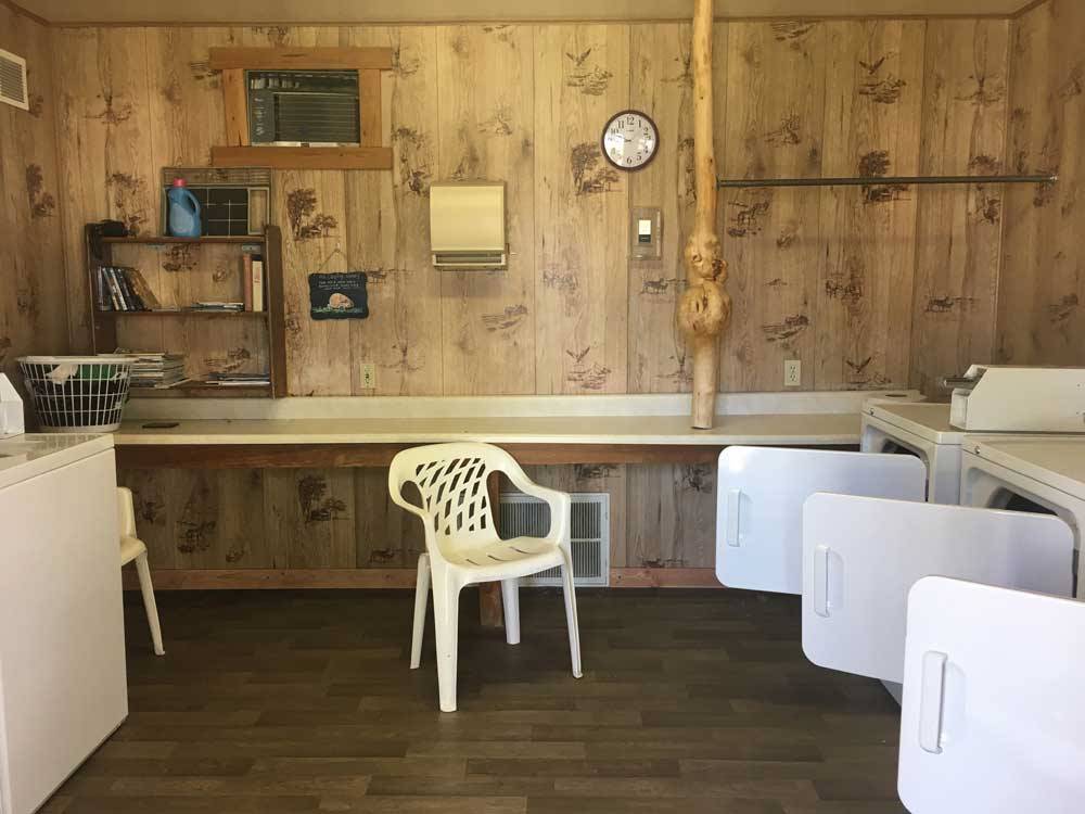 Interior view of the laundry room at AB CAMPING RV PARK