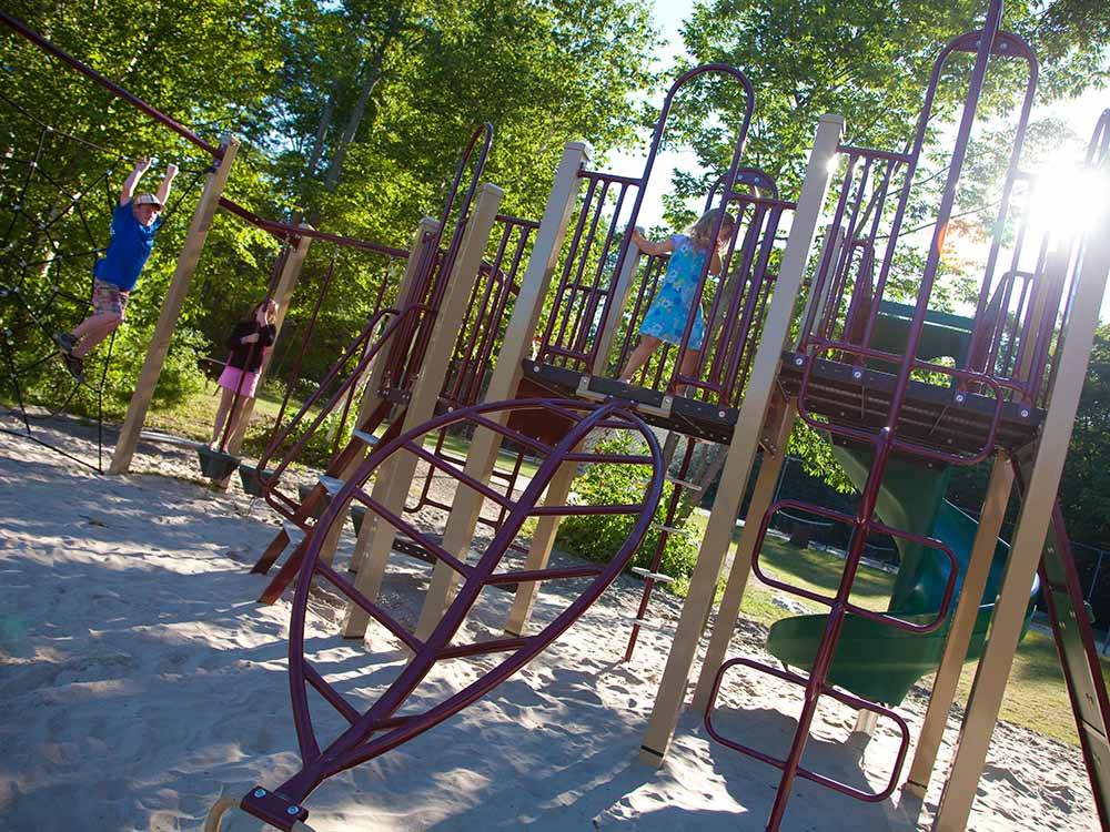 Kids playing on the playground equipment at SUMMER HOUSE PARK
