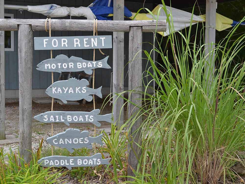 A sign saying what they have for rent at SUMMER HOUSE PARK