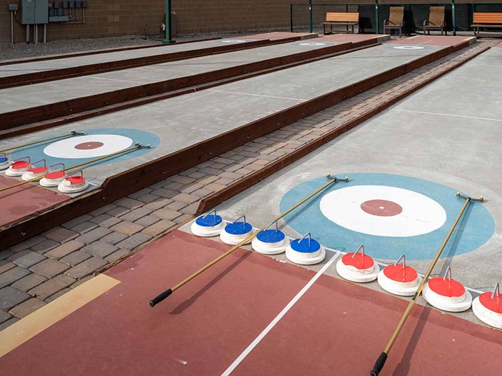 A row of curling courts at SUNDANCE RV RESORT