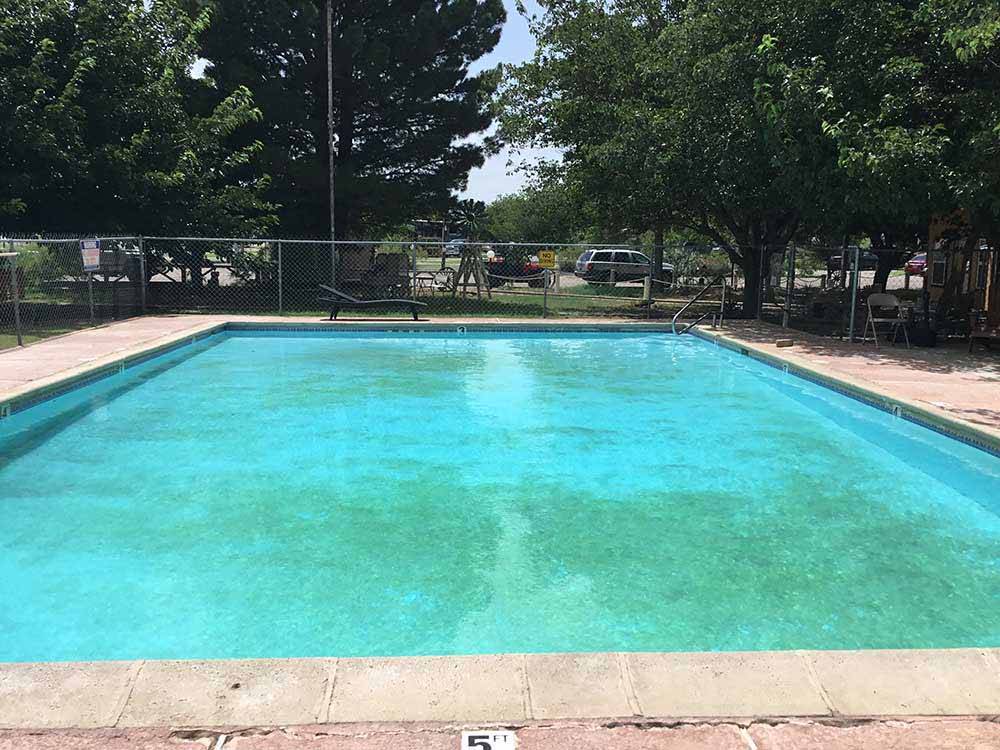 A full view of the swimming pool at FORT STOCKTON RV PARK