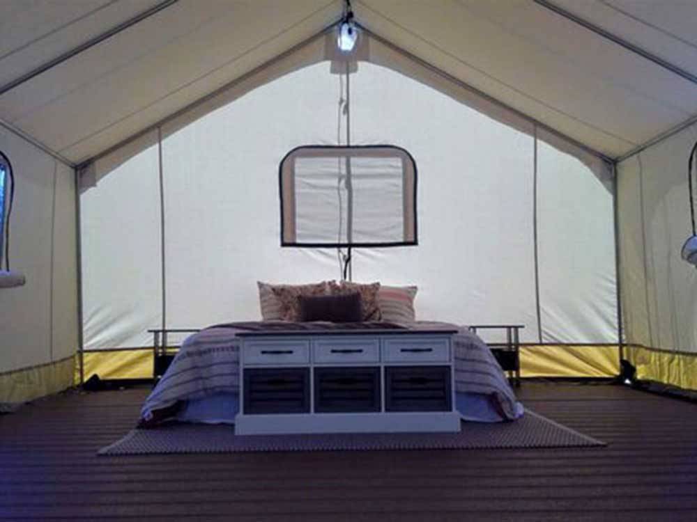Inside of one of the glamping tents at REDWOOD MEADOWS RV RESORT