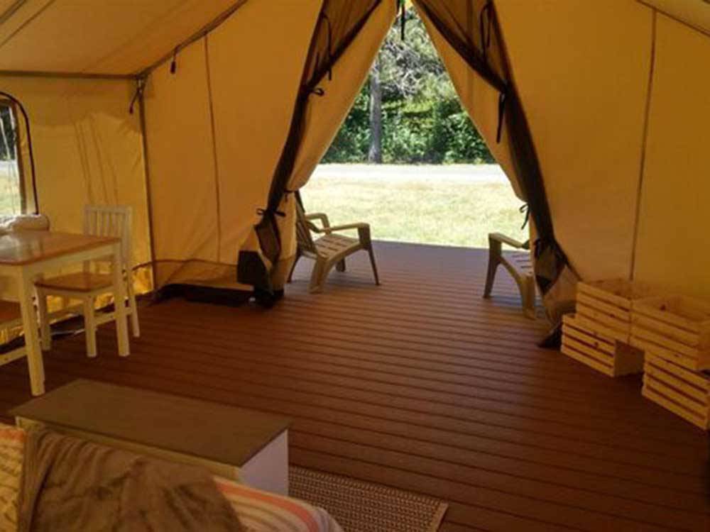 Looking out of one of the glamping tents at REDWOOD MEADOWS RV RESORT