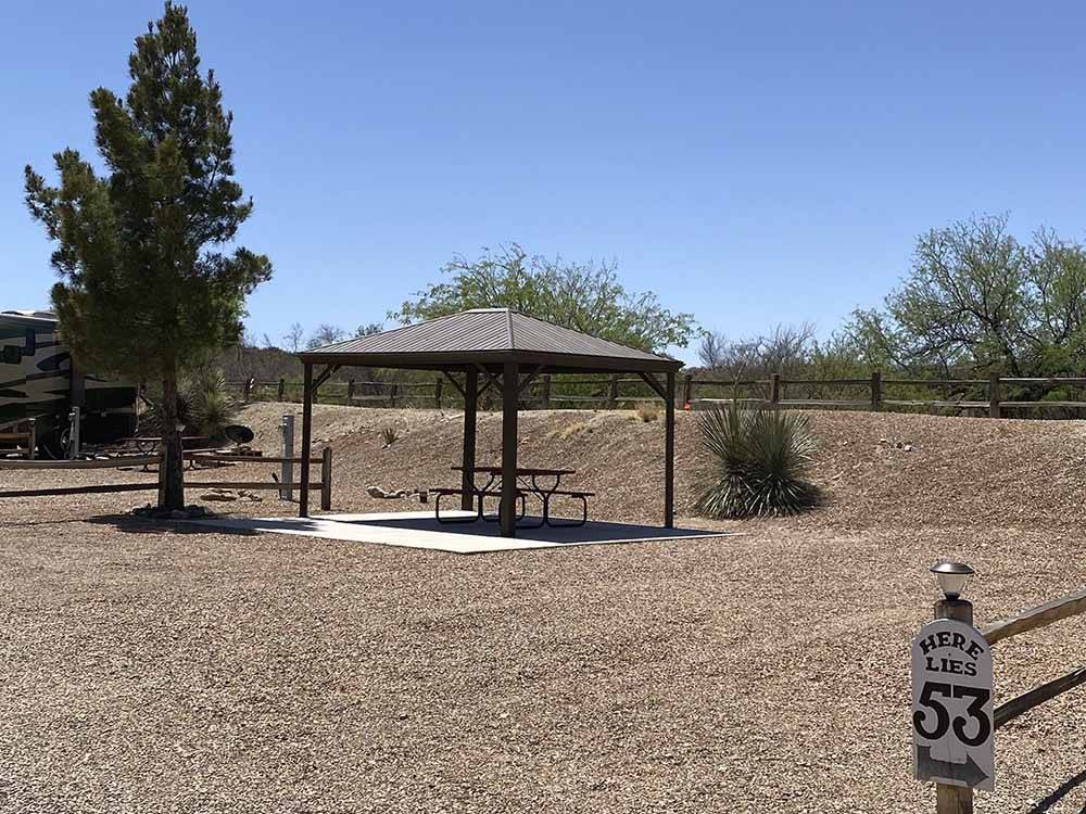 A picnic table and gazebo at TOMBSTONE RV PARK