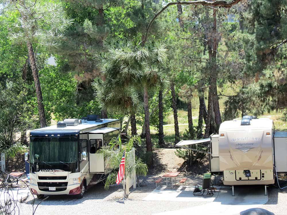 Two RVs parked in sites at RANCHO LOS COCHES RV PARK