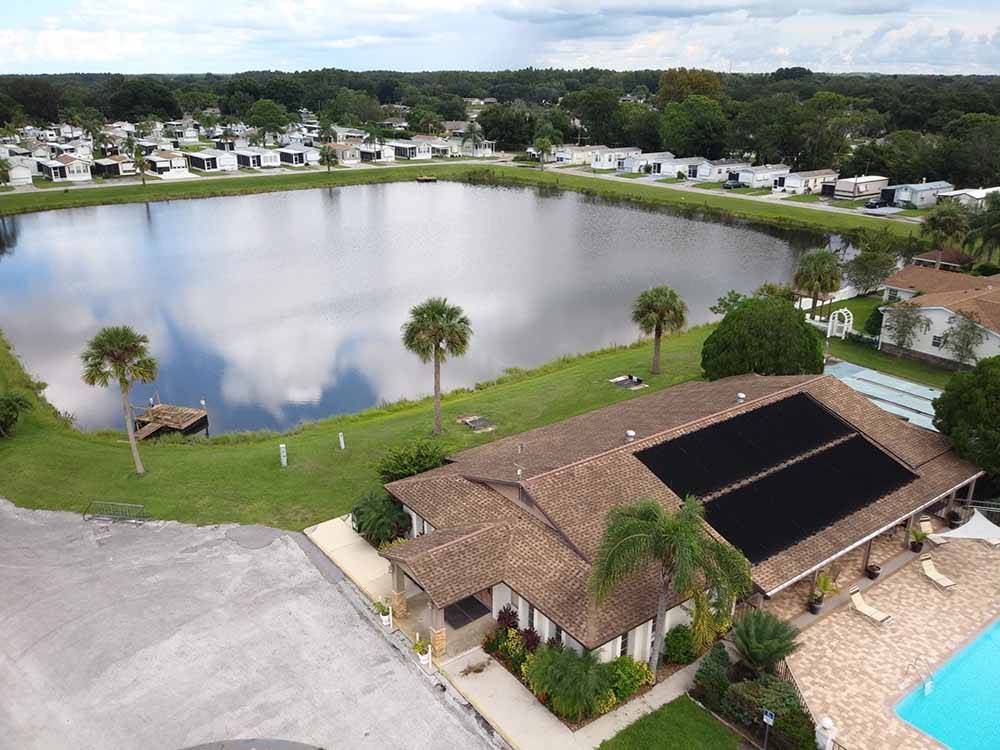 Aerial view of the lake and clubhouse at SEVEN SPRINGS TRAVEL PARK