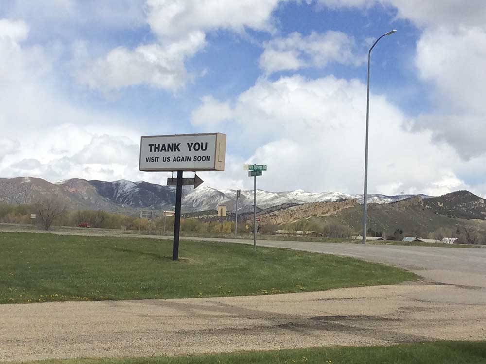 The thank you, visit us again soon sign at HOLIDAY HILLS RV PARK