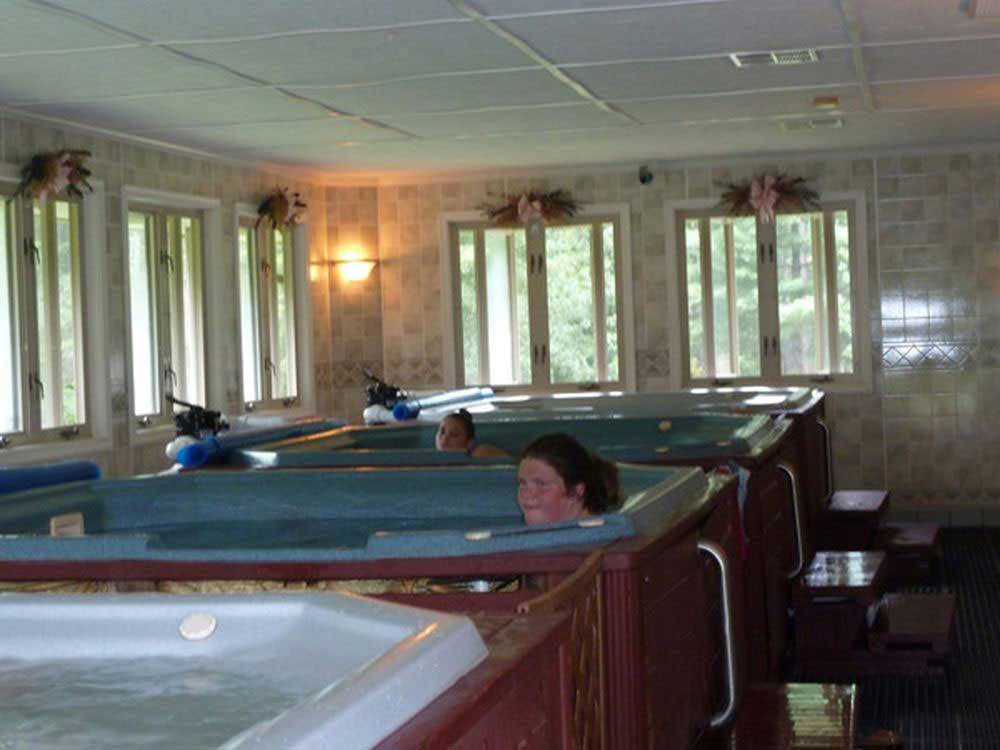 Indoor hot tubs next to each other at SHENANDOAH VALLEY CAMPGROUND