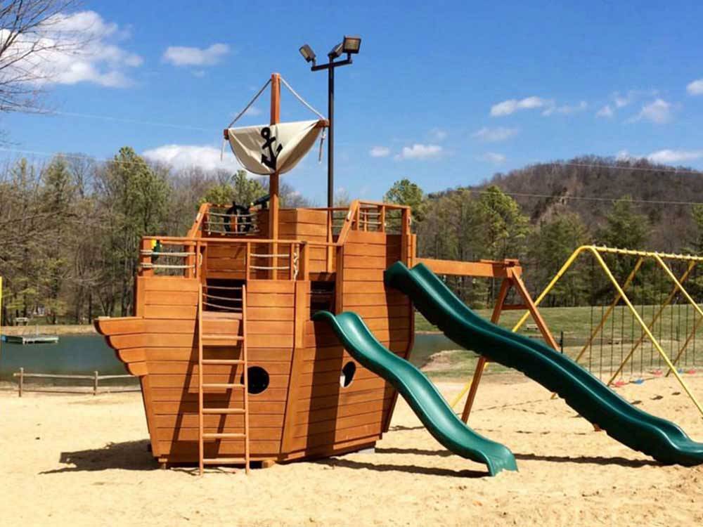 Playground with swing set at SHENANDOAH VALLEY CAMPGROUND