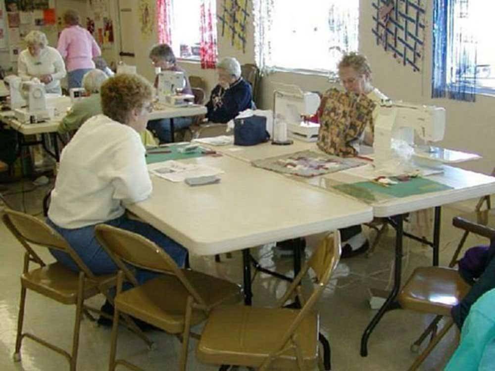 Women sewing at WEAVER'S NEEDLE RV RESORT