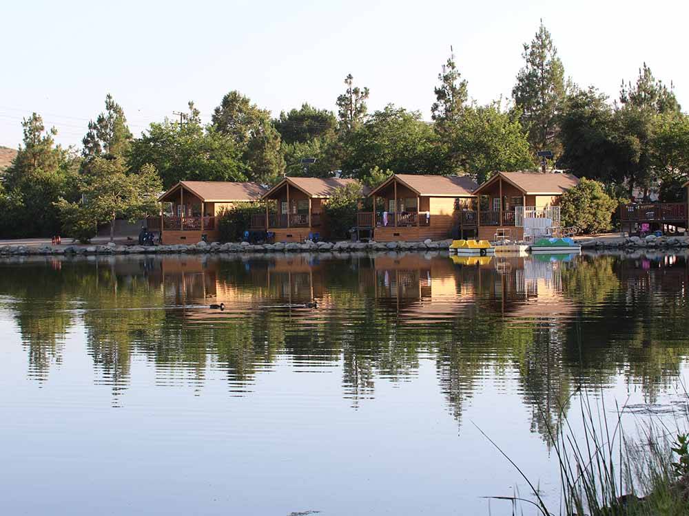 A row of rental cabins along the water at SANTEE LAKES RECREATION PRESERVE