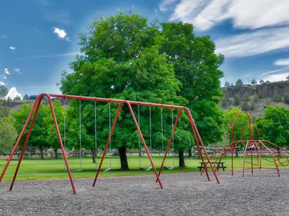 The metal swing sets at CROOKED RIVER RANCH RV PARK