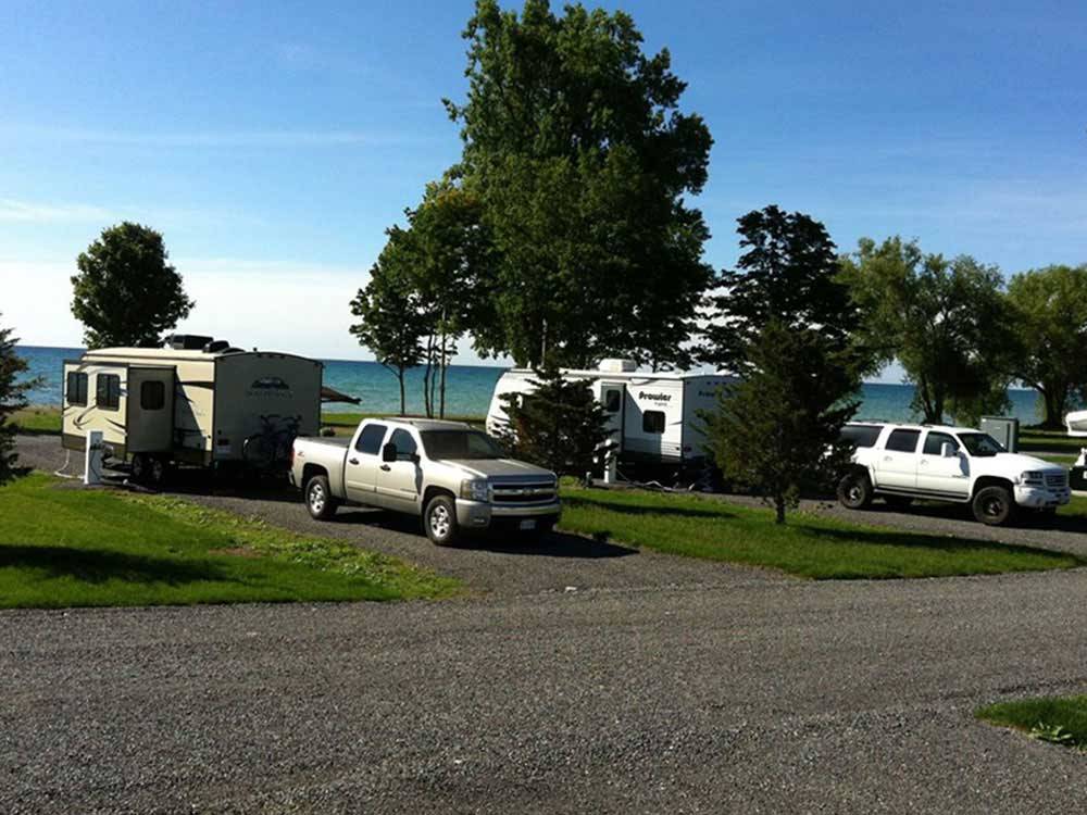 Trailers camping on the water at QUINTE'S ISLE CAMPARK